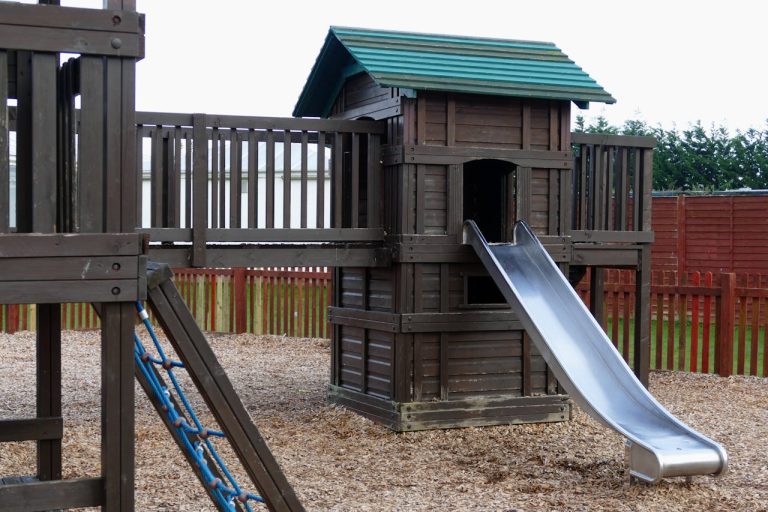 Kids play park with slide and rope climb