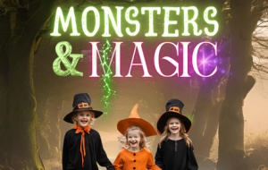 Monsters & Magic and three children dressed up for Halloween