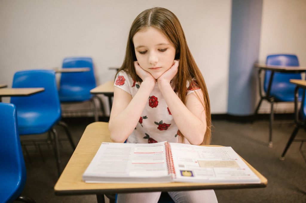 Child looking worried in school