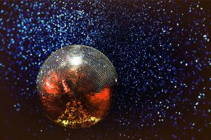 disco ball on navy sparkly background