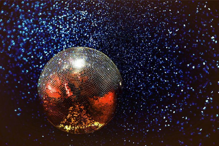 disco ball on navy sparkly background