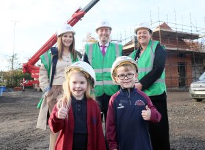 Education Minister Paul Givan has visited Scoil an Droichid Primary School to view progress on its major capital construction project, formally marking the next phase of development.