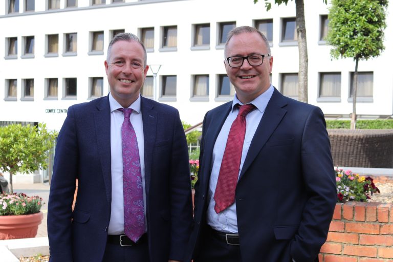 Education Minister Paul Givan pictured with Tom Bennett who will lead on a review of behaviour policy and practice across schools.